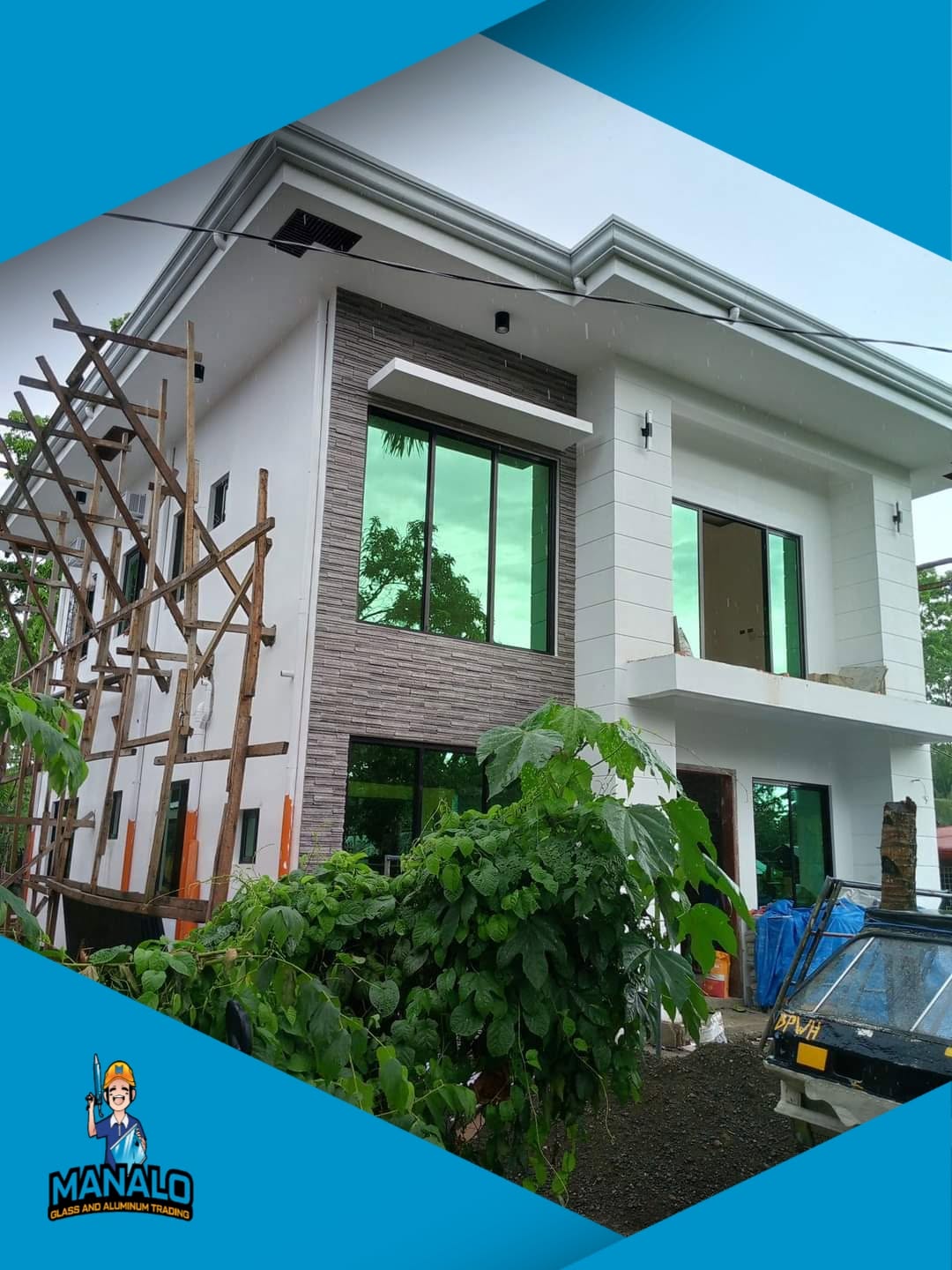 Home with new sliding windows and fixed glass by Manalo Glass and Aluminum Trading